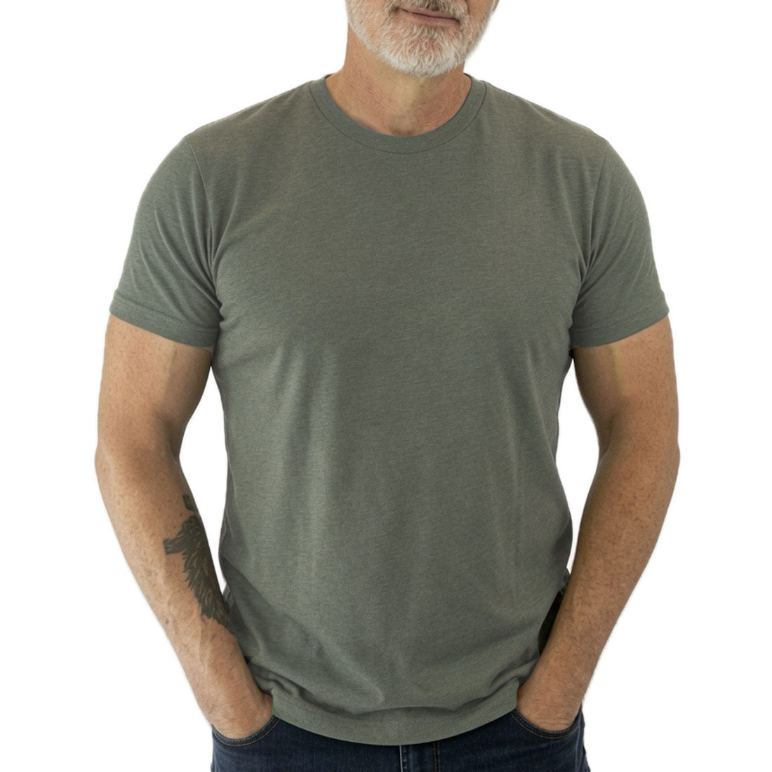 Tapered T-Shirts For Men - MILITARY GREEN | TAPERED TEES Man wearing olive-green crew-neck T-shirt with hands in pockets at waist level.
